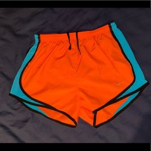 Woman’s Orange and Blue Nike Running Shorts